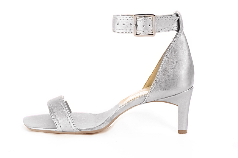 Light silver women's closed back sandals, with a strap around the ankle. Square toe. Medium comma heels. Profile view - Florence KOOIJMAN